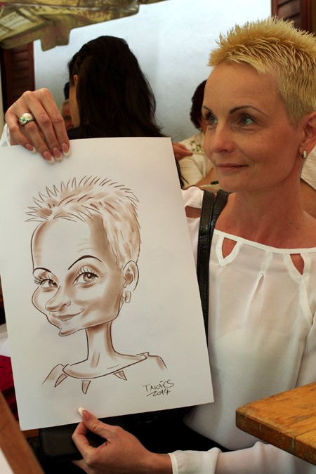 Karikaturista na firemnej akcii